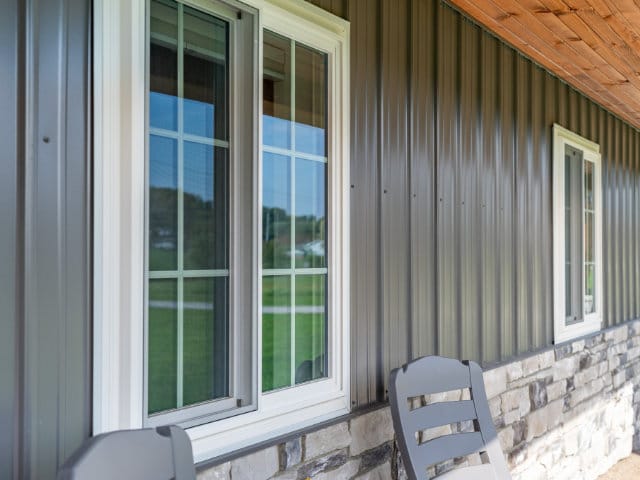 Modern cottage with stone and metal